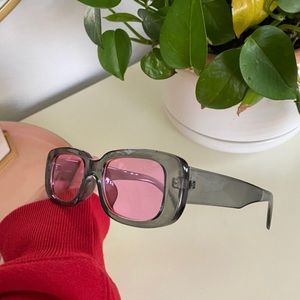 Chunky grey and pink glasses